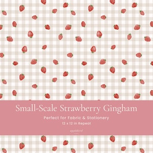 May include: A repeating pattern of small red strawberries on a light beige and white gingham background. A pink horizontal banner at the bottom displays the white text: Small-Scale Strawberry Gingham, Perfect for Fabric & Stationery, 12 x 12 in Repeat, applebird studio.