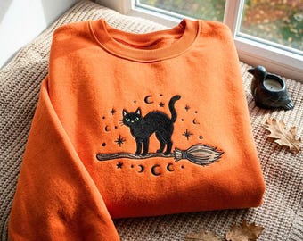 Embroidered Black Cat Broomstick Sweatshirt – Cozy Halloween Apparel