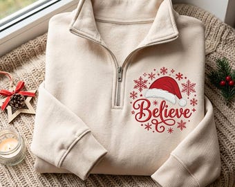 Besticktes „Believe“-Weihnachts-Sweatshirt mit Viertelreißverschluss, festliche Weihnachtsbekleidung