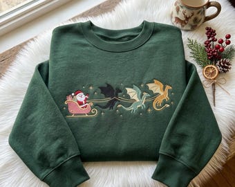 Sudadera navideña bordada con el Cuarto Ala, suéter navideño de trineo de dragón, Navidad fantástica, camiseta de jinete de dragón, regalo de merchandising para fans de Booktok