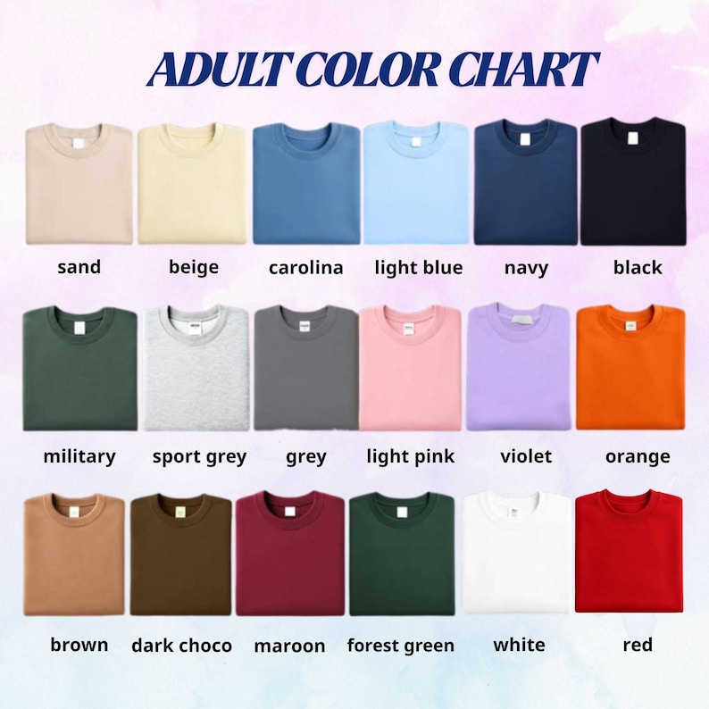 Op de afbeelding: Een kleurenkaart voor volwassenen met achttien sweaters met ronde hals in verschillende effen kleuren. De tekst ADULT COLOR CHART staat bovenaan. De kleuren zijn zand, beige, carolina, lichtblauw, marine, zwart, militair, sportgrijs, grijs, lichtroze, violet, oranje, bruin, donkerchocolade, bordeaux, bosgroen, wit en rood.