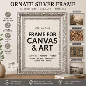 May include: An ornate silver frame with a rectangular profile and intricate detailing. The central area features text reading "FRAME FOR CANVAS & ART" with lists of compatible items like paintings, posters, photos, rugs, kilims, and tapestries.