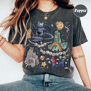 Retro Epic Universe Comfort Colors Shirt, Vintage Orlando Park Epic Universe Tee, Coquette Bow Mario Baby Tee, How To Train Your Dragon image 2