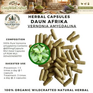 May include: An image of herbal capsules labeled "Daun Afrika" and "Vernonia amygdalina." The capsules are a light brown color and are scattered across a white background. A green circular graphic shows a plant. The text "100% Organic Wildcrafted Natural Herbal" is at the bottom.