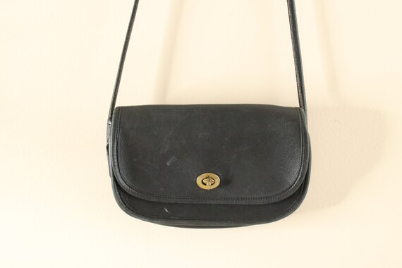 small navy blue coach purse