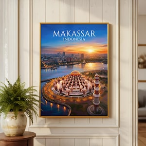 May include: A framed wall art print featuring a sunset view of the 99 Domes Mosque in Makassar, Indonesia. The image displays the mosque's golden domes and tall minaret by the water, with the city skyline in the background and the text MAKASSAR INDONESIA.