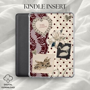 May include: A Kindle insert featuring a cream background with dark red polka dots, a dark red lace strip, a heart-shaped lace frame with the text Becoming everything I once dreamed of, a white lily, a black swan photo, and a deer illustration.