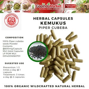 May include: A photograph of herbal capsules, identified as "Kemukus Piper Cubeba". The capsules are a light tan colour and oval, with a small inset image of black seeds. The text states the capsules are 100% organic and wildcrafted.