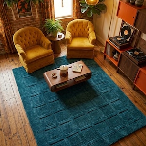 May include: A retro-style living room with mustard yellow armchairs, a teal rug, and a wooden coffee table. The room features a record player, vintage posters, and a large window with orange curtains. The room has a warm, inviting atmosphere.
