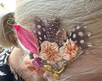 Barrette with feathers