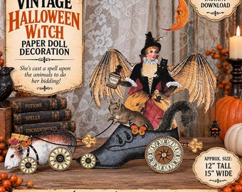 May include: A vintage Halloween witch paper doll decoration featuring a witch with bat wings, a black cat, and a squirrel in a shoe-shaped carriage with clock-face wheels. The text reads VINTAGE HALLOWEEN WITCH PAPER DOLL DECORATION and 12" TALL 15" WIDE.