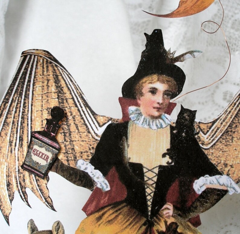 May include: A witch with brown wings, a black hat, and a red and black cape holds a bottle labeled "Elixir" and a black cat.