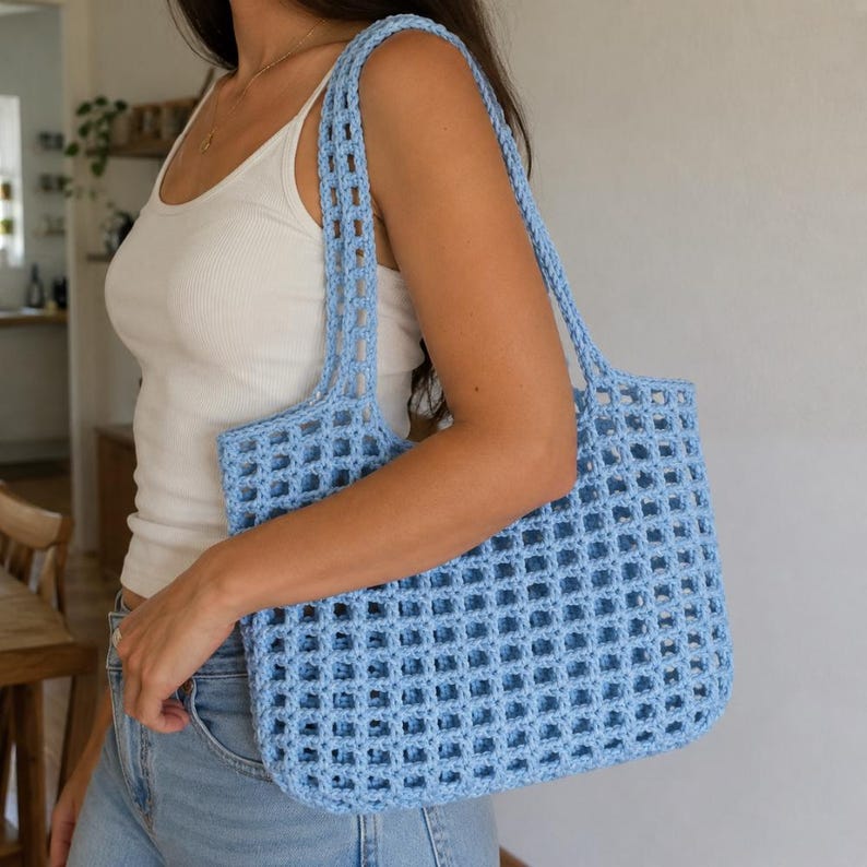 A woman wearing crochet tote bag for summer