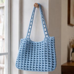 Crochet mesh bag hanging on wall