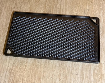Plancha de hierro fundido Lodge precurada, reversible, de doble cara, fabricada en EE. UU. (3LPD), 9" x 16".