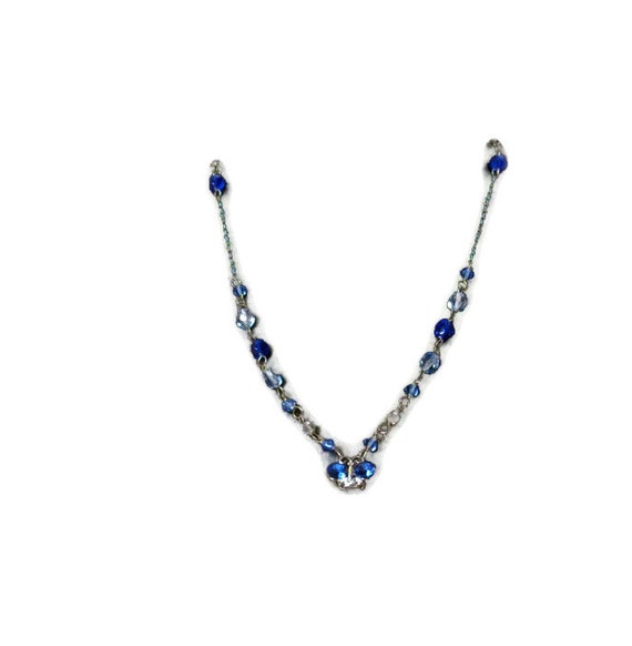 Download Items similar to Delicate blue butterfly necklace on Etsy