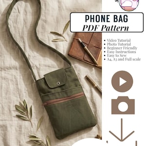 Könnte beinhalten: Eine olivgrüne Umhängetasche für Handys mit Klappverschluss, Druckknopf und einer Reißverschlusstasche auf der Vorderseite. Das Bild enthält den Text: PHONE BAG PDF Pattern, Video Tutorial, Photo Tutorial, Beginner Friendly, Easy Instructions, Easy to Sew, A4, A3 and Full scale, und INSTANT DOWNLOAD.