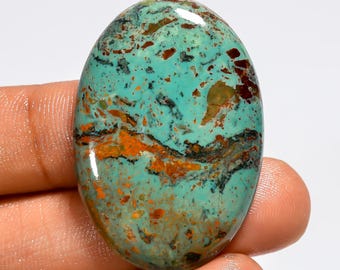 Cabochão de turquesa cobre do Arizona, polido em ambos os lados, medindo 37 x 25 x 5 mm.