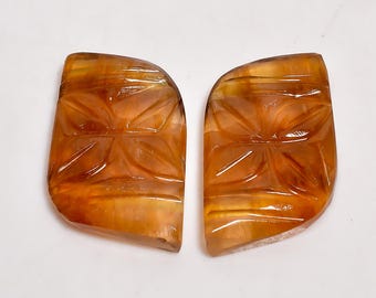Par de cabochões de fluorita com base plana, polimento liso e multicoloridos, tamanho 23x16x4 mm.