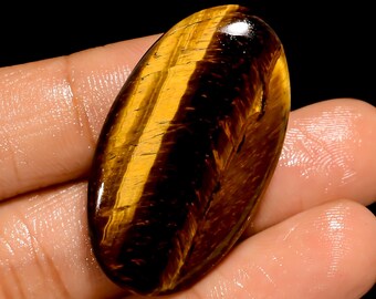 Cabochon Occhio di Tigre con retro piatto e lati lucidati, cristallo di tigre, dimensioni 36x20x5 mm, pietra Fireplay.