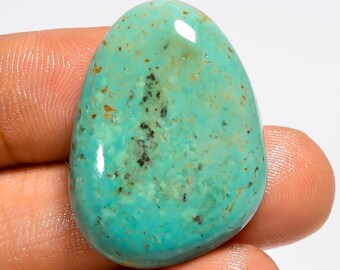 Cabochão de turquesa cobre do Arizona, polido em ambos os lados, medindo 29 x 21 x 7 mm.