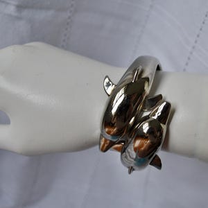 Vintage 1980s Hinged By-Pass Bracelet, Pair of Circling Dolphins: Modernist, Nautical, Statement Bracelet