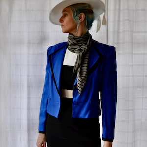 May include: A rustic wooden sign with the text "Welcome to our home" in white lettering. The sign features a distressed finish and a simple, inviting design, perfect for entryway decor.