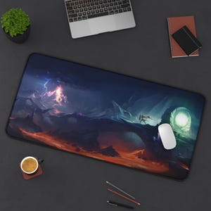 May include: A large rectangular mousepad featuring a fantasy landscape with a warrior figure, a glowing portal, and a stormy sky. The design incorporates shades of blue, orange, and purple. A white mouse rests on the pad.