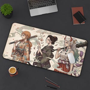 May include: A rectangular mouse mat featuring three anime-style female characters in traditional Japanese dress, each holding a weapon. The mat has a beige background with floral and cloud-like designs. A white computer mouse is visible.
