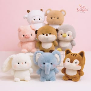 May include: A selection of plush animal toys, featuring a white bunny, blue elephant, and brown fox. Other animals include a pig, cow, bear, otter, and penguin. The toys are soft and cuddly, with embroidered details and a cute design.