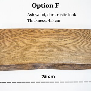 Rustic live edge monitor riser made from solid ash wood, wooden desk shelf that elevates monitors and provides extra space for keyboard storage underneath.
