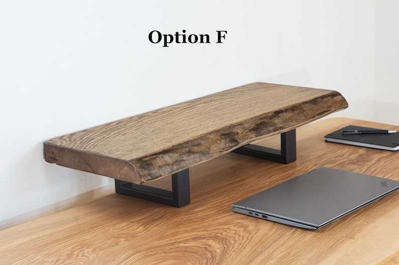 Solid ash wood desk shelf with natural live edge, wooden monitor stand designed for laptop or monitor setups, rustic desk organizer for modern home office workspace.