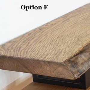 Live edge desk shelf made from solid ash wood with authentic grain texture, wooden monitor stand perfect for modern home office desk setups.