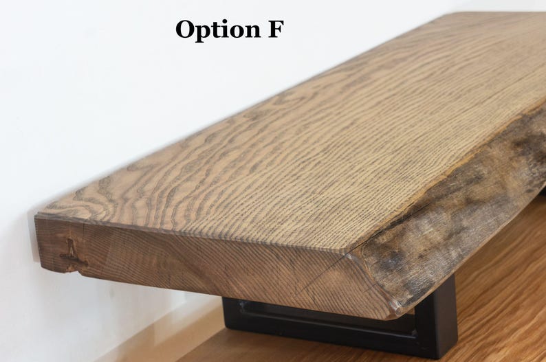Live edge desk shelf made from solid ash wood with authentic grain texture, wooden monitor stand perfect for modern home office desk setups.