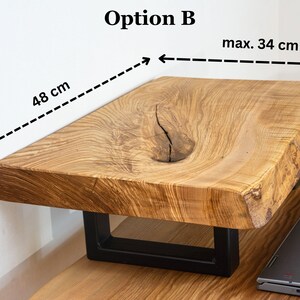 Rustic live edge monitor riser made from solid ash wood slab, wooden desk shelf designed for minimal desk setups and natural office interiors.