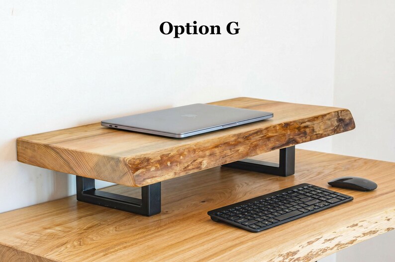 Rustic ash wood monitor stand with natural live edge design, solid wood desk riser that improves screen height and workspace organization.