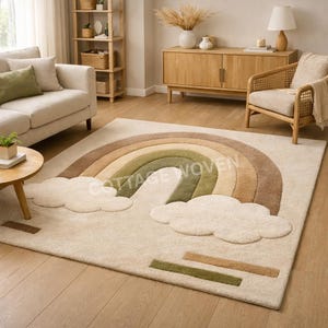 May include: A rectangular area rug featuring a rainbow design in shades of brown, green, and beige, with fluffy cloud accents. The rug is placed on a wooden floor in a living room setting.