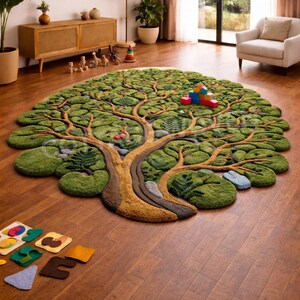 May include: A green, tree-shaped rug with a brown trunk and branches, placed on a hardwood floor. The rug has a textured, plush appearance, with various shades of green representing the leaves. Colorful wooden blocks and a puzzle are on the rug.