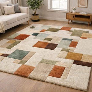 Handgetuft patchwork vloerkleed – modern geometrisch wollen tapijt.