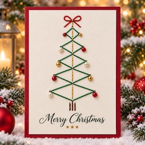 May include: A rectangular greeting card with a cream-colored center panel and a dark red border. The card features a stylized Christmas tree design created with green thread, gold vertical stitching, a red bow, and small red, gold, and white beads.