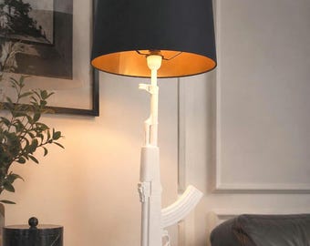 Lámpara de mesa New Gun - Diseño de Philippe Starck - Fabricada por Flos 2005
