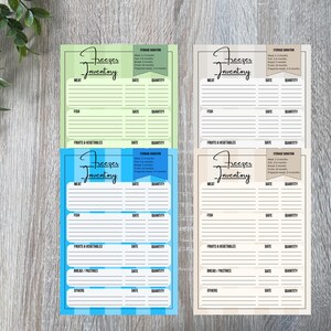 May include: Four freezer inventory sheets in green, blue, white, and beige. Each sheet has sections for meat, fish, fruits & vegetables, and other items. The sheets are designed to help track food storage. The words "Freezer Inventory" are at the top.