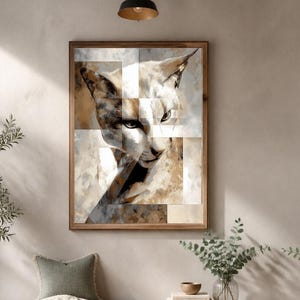May include: A rectangular wall art piece featuring a stylized, geometric portrait of a cat in shades of brown, beige, and white. The artwork is enclosed in a simple wooden frame and is displayed on a neutral-toned wall above a wooden bench.