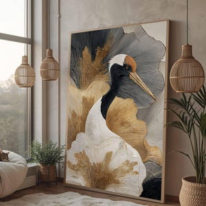 May include: A large rectangular wall art piece featuring a stylized crane with a white body, black neck, and orange crown, set against a textured background of gold, gray, and white brushstrokes, framed in a thin light wood border.