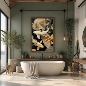 May include: A rectangular wall art piece featuring three koi fish swimming among abstract gold and white floral shapes on a dark background, framed in wood, displayed above a white oval freestanding bathtub in a room with sage green walls.