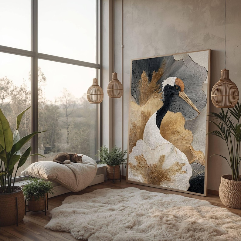 May include: A large rectangular wall art piece featuring a stylized crane with a white body, black neck, and orange crown, set against a textured background of gold, gray, and white brushstrokes, framed in a thin light wood border.