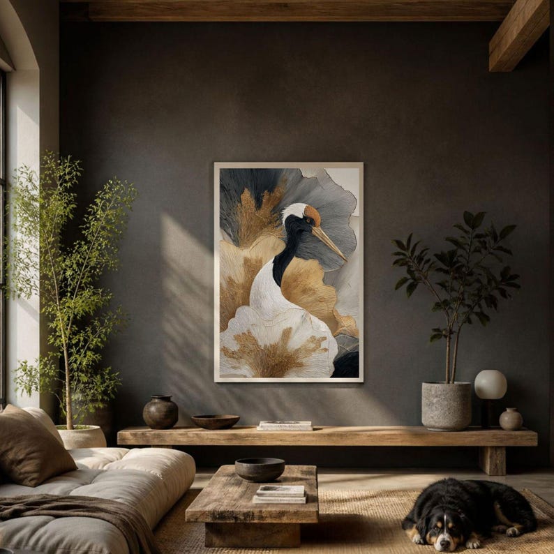 May include: A framed vertical wall art print featuring a stylized red-crowned crane with a white body, black neck, and orange crown. The background consists of abstract, flowing layers in shades of charcoal gray, cream, and metallic gold leaf accents.