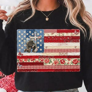 May include: A white ceramic mug with a black handle and the text "But First, Coffee" in a black, bold font. The mug is likely 325 ml in size and sits on a white surface.