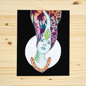 May include: A digital illustration of a woman with a third eye, surrounded by a swirling pattern of flowers and leaves. The woman's skin is blue, and her hair is a vibrant mix of pink, purple, and green.