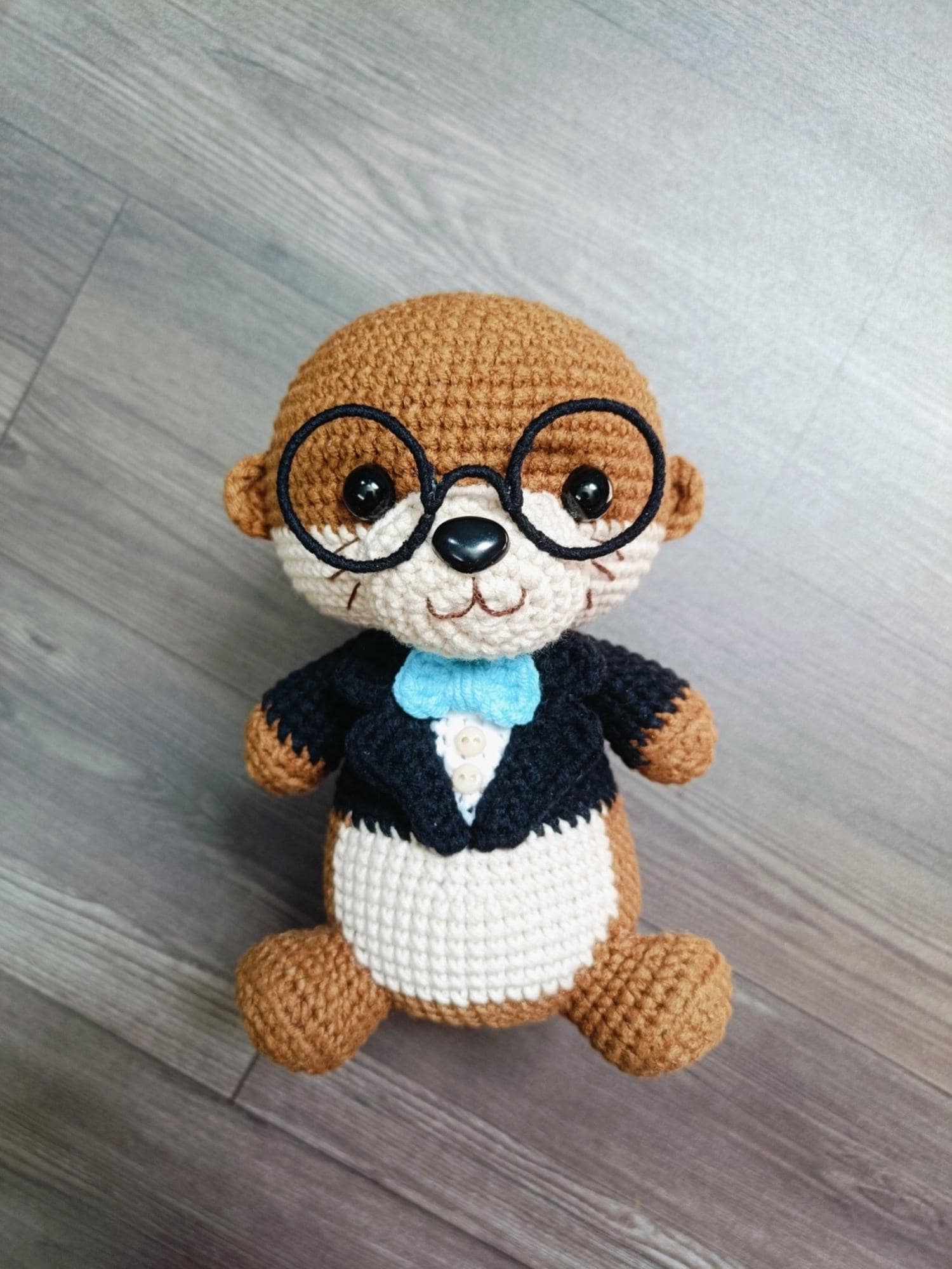30 Otter Crochet Patterns for Cute Gifts, Nursery Decor, and Pocket-Sized Amigurumi 29 Dapper Otter in Vest Pattern